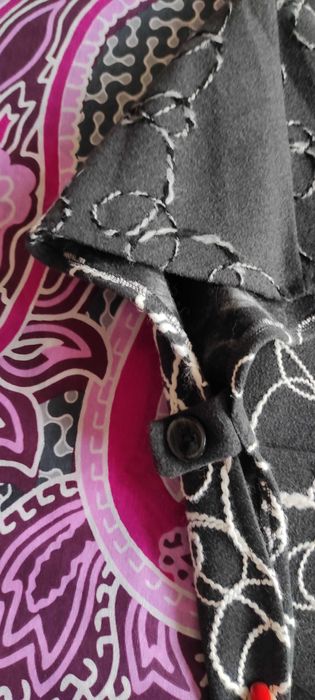 Късо палто тип пеперуда и черно сако.