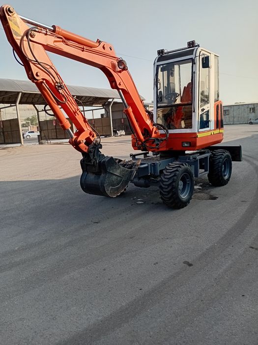 Услуга Колесный экскаватор мини    аренда малютка