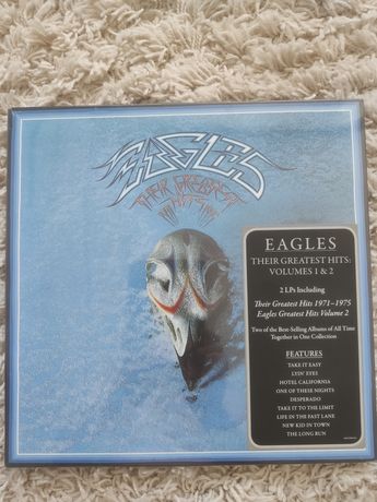 СД диски,AcDs и Beatles и виниловая пластинка Eagles