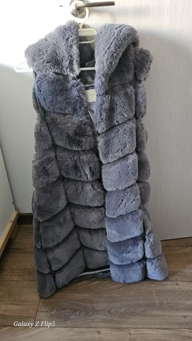 Дълъг пухен елек