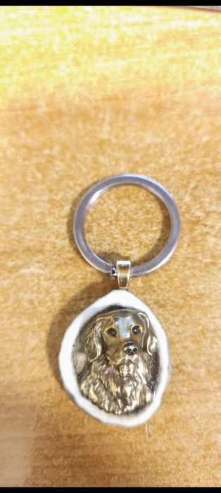 Ръчно изработен Голден Ретривър от бронз върху еленски рог