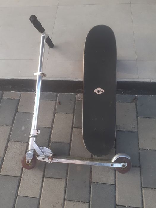 Skateboard si trotineta