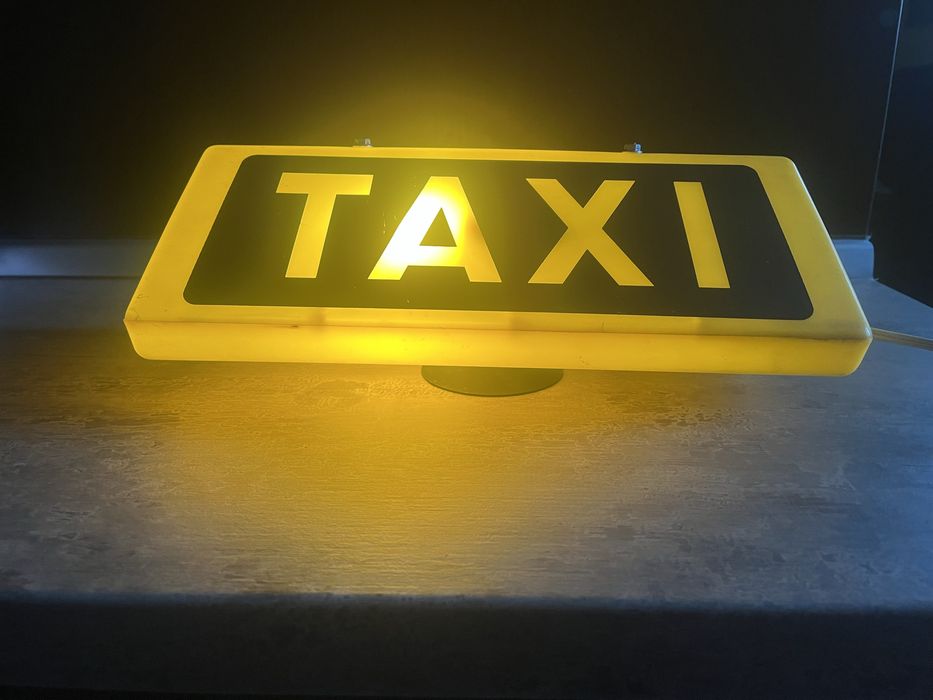 Firma Taxi decorativa