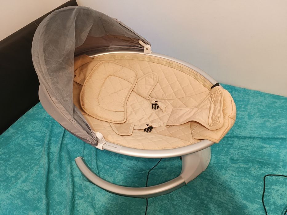 Leagan electric multifunctional pentru bebelusi