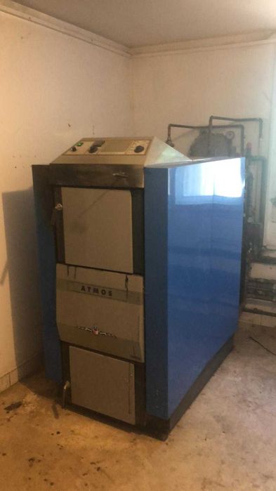 centrala Atmos 75 kw pe lemne in stare buna de functionare unic propri