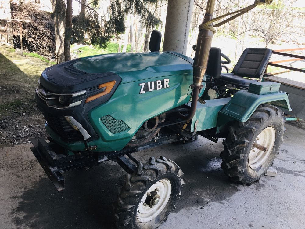 Traktor kafolatli