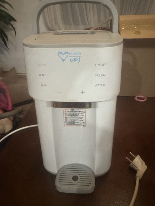 Aparat multifunctional pentru preparerea formulei de lapte praf