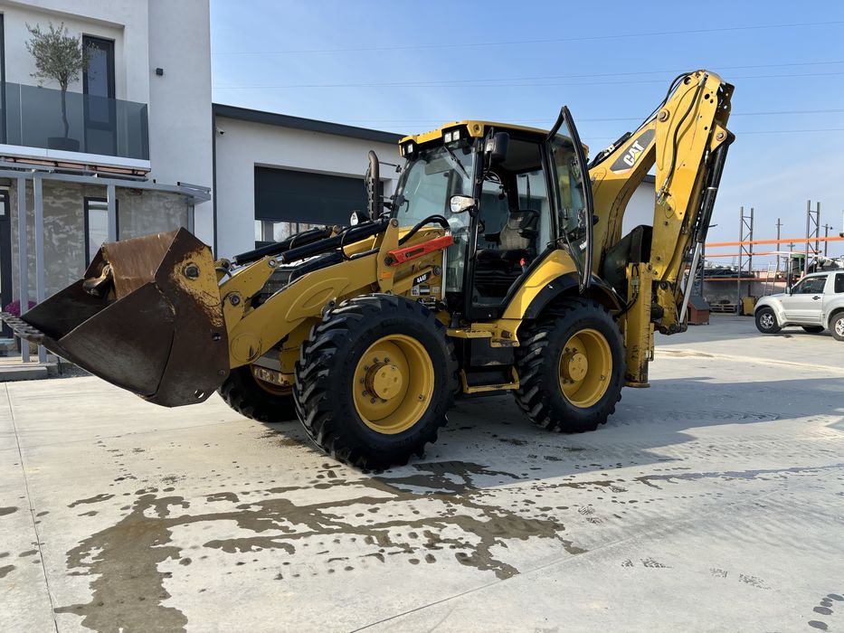 Buldoexcavator CAT 444 F . 2015