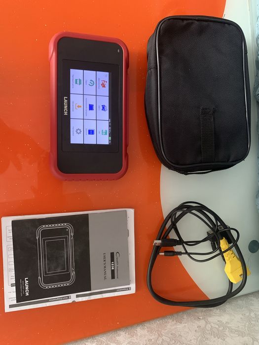 Продам автосканер лаунч 123е