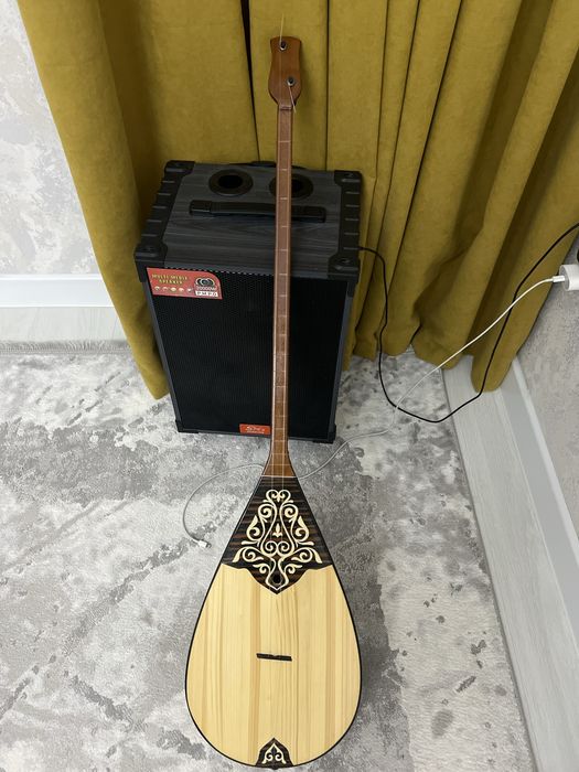 Домбыра тап таза күйдікі