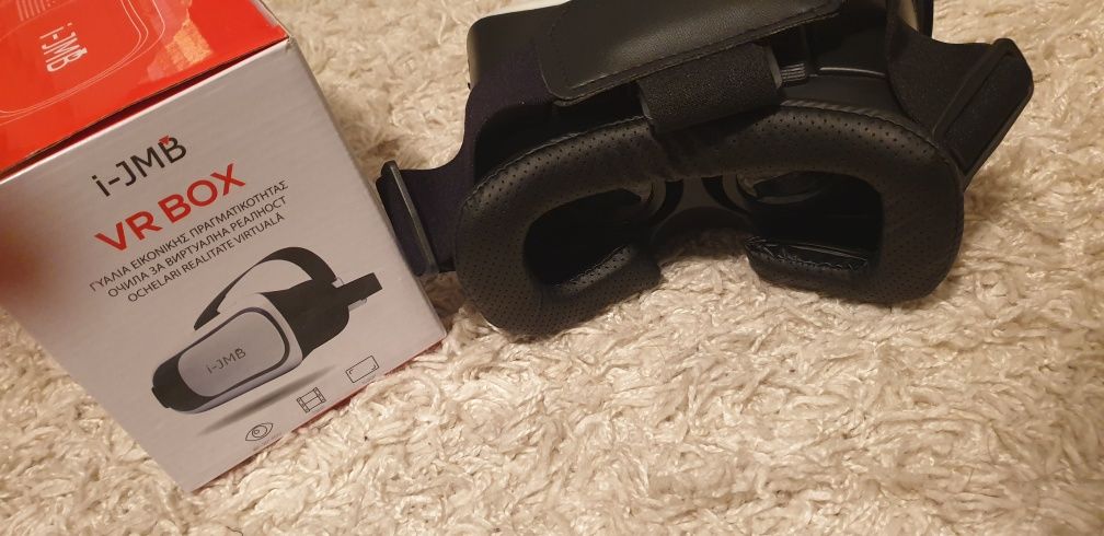 Vând ochelarii VR Box