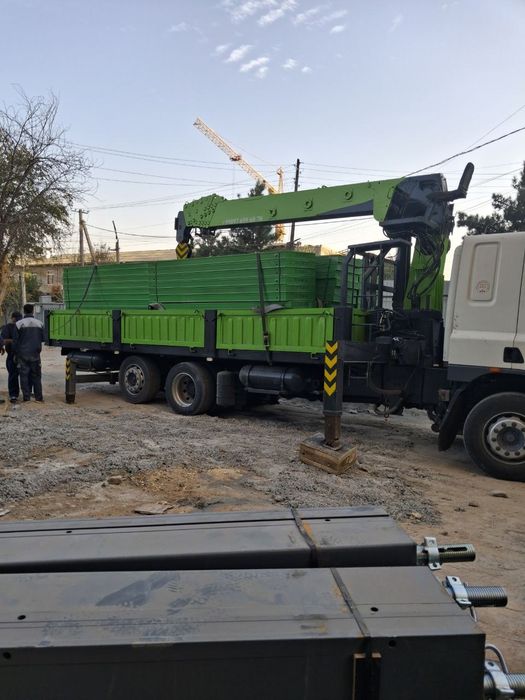 Manipulyator xizmati yuk kutarishi 15 tonna strelo 7 tonna strelo uzun