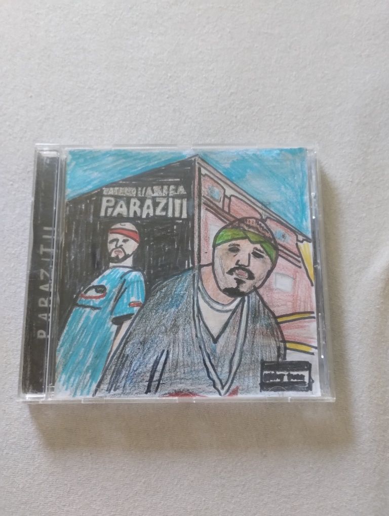 Parazitii Categoria grea (sindrumul down)reeditarea 2005 înaintea erei