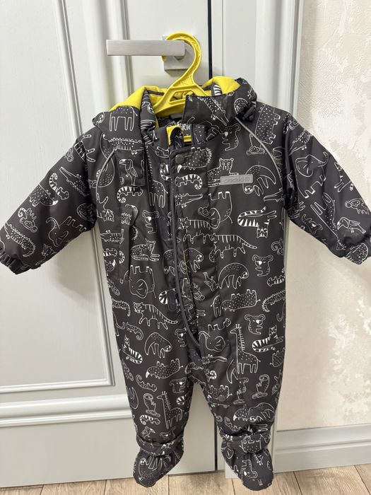 Продам зимний комбинезон новый