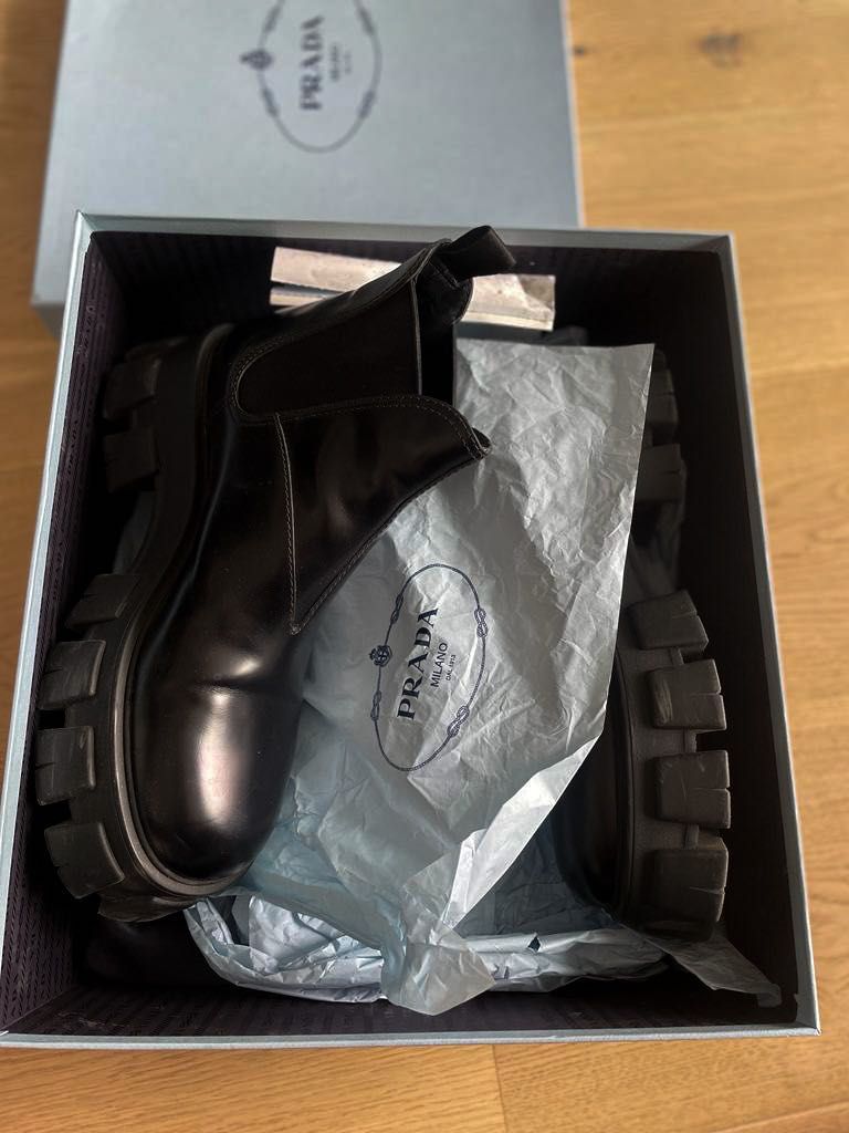 PRADA
Monolith leather ankle boots