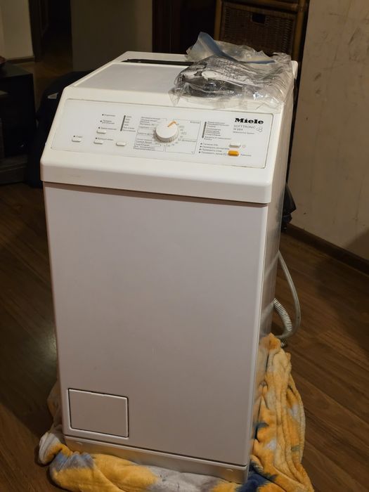 Стиральная машина Miele W664 (вертикальная загрузка)