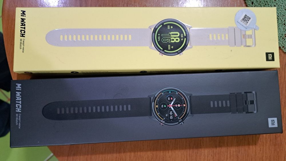 Smartwatch 2 bucati Xiaomi Mi Watch unul  bej dama si unul negru