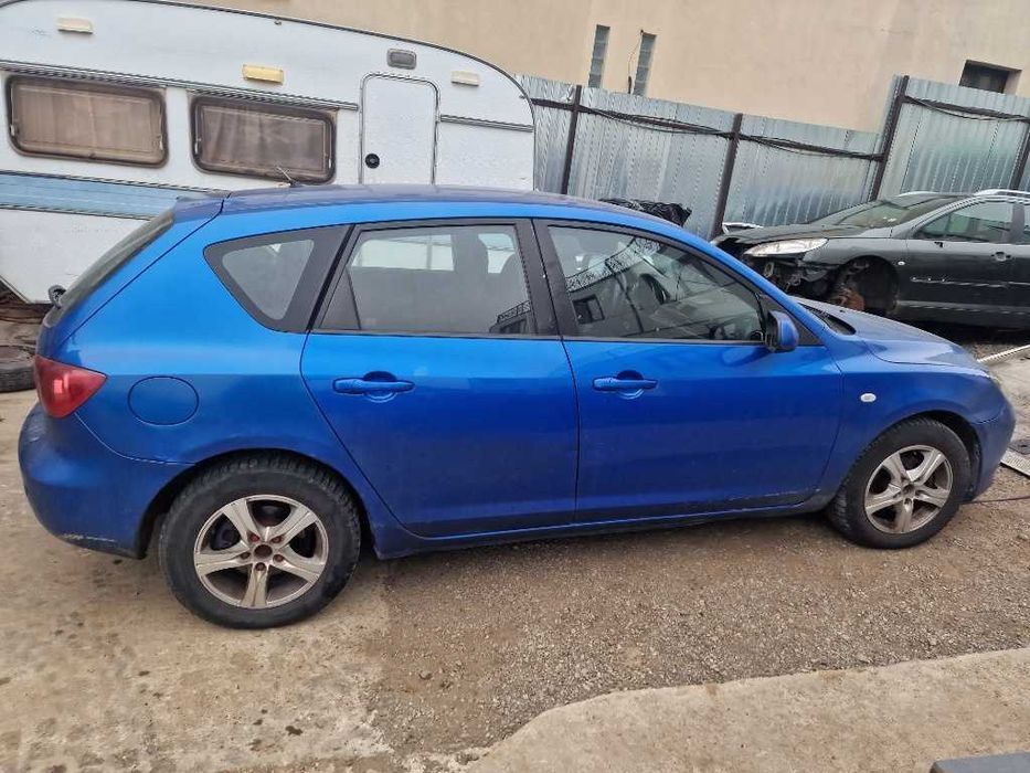 Dezmembrez Mazda 3 1.6 diesel 80KW an 2005 volan stanga