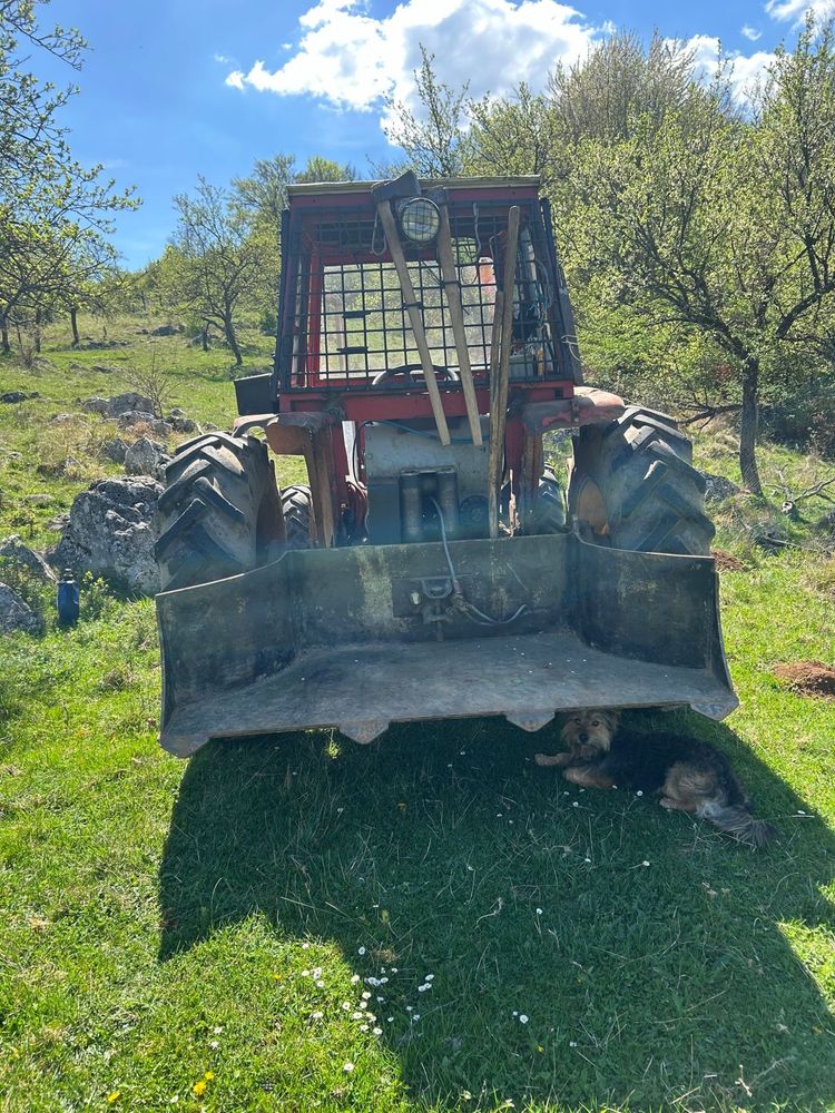 Vand tractor cu troliu