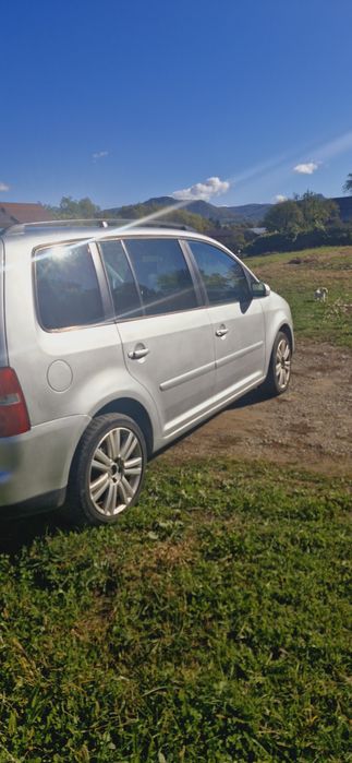 Vand touran 2007 sau schimb cu t4 doka