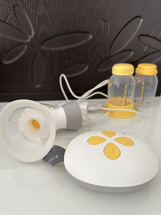 Medela solo електрическа помпа за кърма - на практика нова  + подаръци