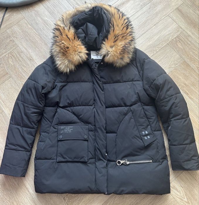 Продам пуховик зимний в отличном состоянии