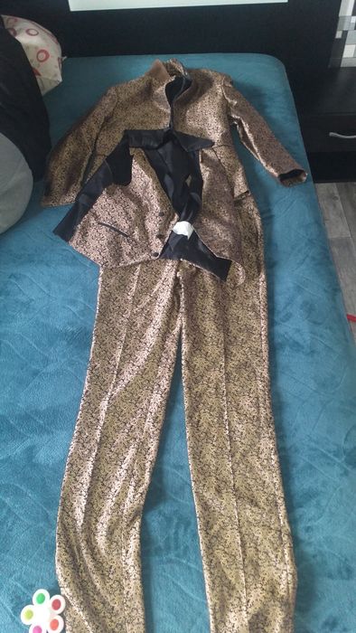 продавам костюм нов