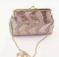 Клъч/малка дамска чанта в розово и златно