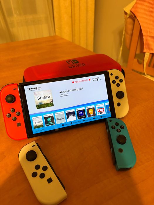 Nintendo Switch OLED – Flashed + Extra controllers + Box + Carry Case
