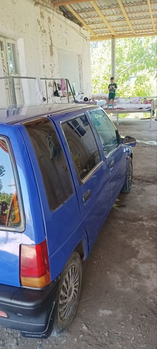 Тико 2000 йил. Бензин пропан .23 млн