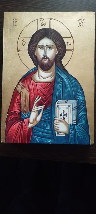 Icoan  pe lemn pictat cu foiță aur vechi . Și una placata argintat.