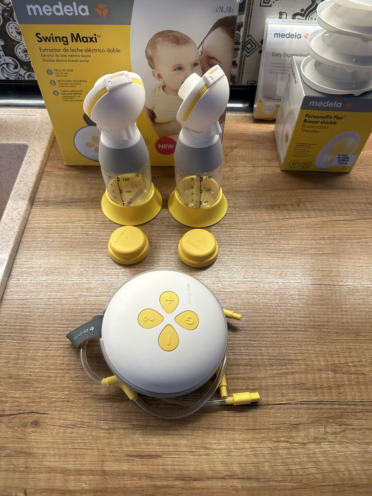 Medela swing maxi двойна електрическа двуфазна помпа за кърма + сутиен