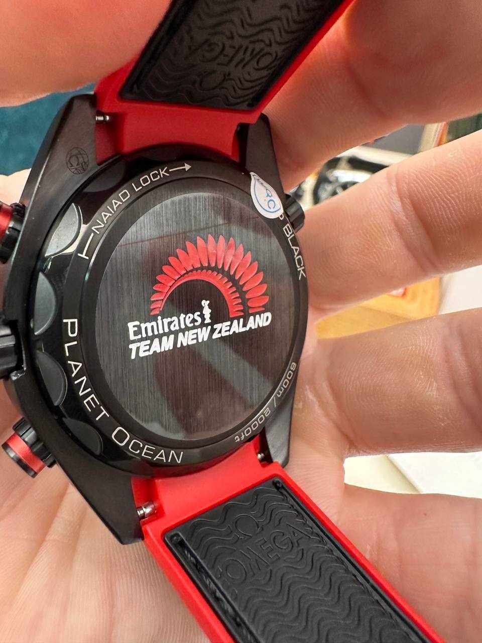 omega seamaster planetocean deep black / red