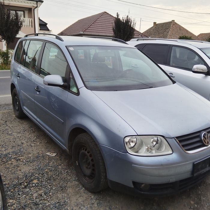 Usa/usi stanga/dreapta Vw Touran an 2003-2008