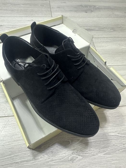 Ер адамның туфлиі