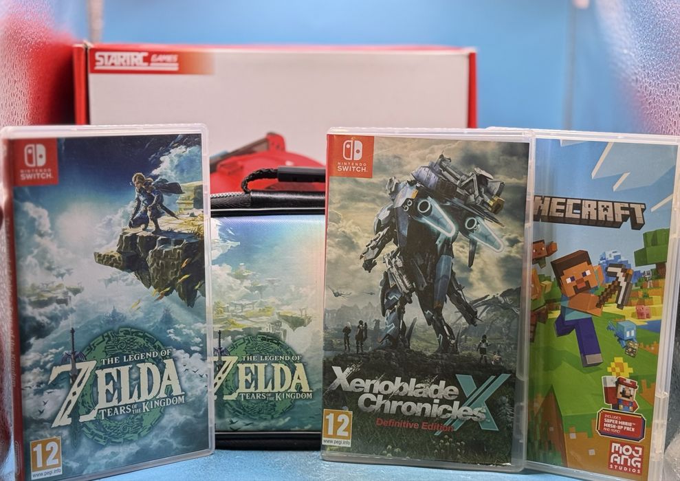 Nintendo Switch OLED + 3 игри + калъф Zelda + аксесоари + VR очила