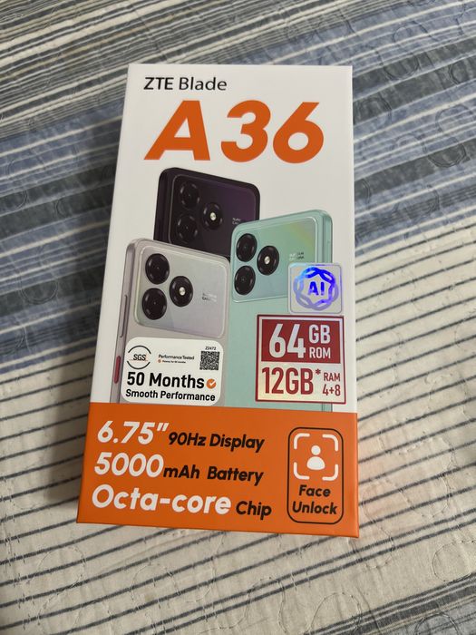 Сотовый телефон в упаковке