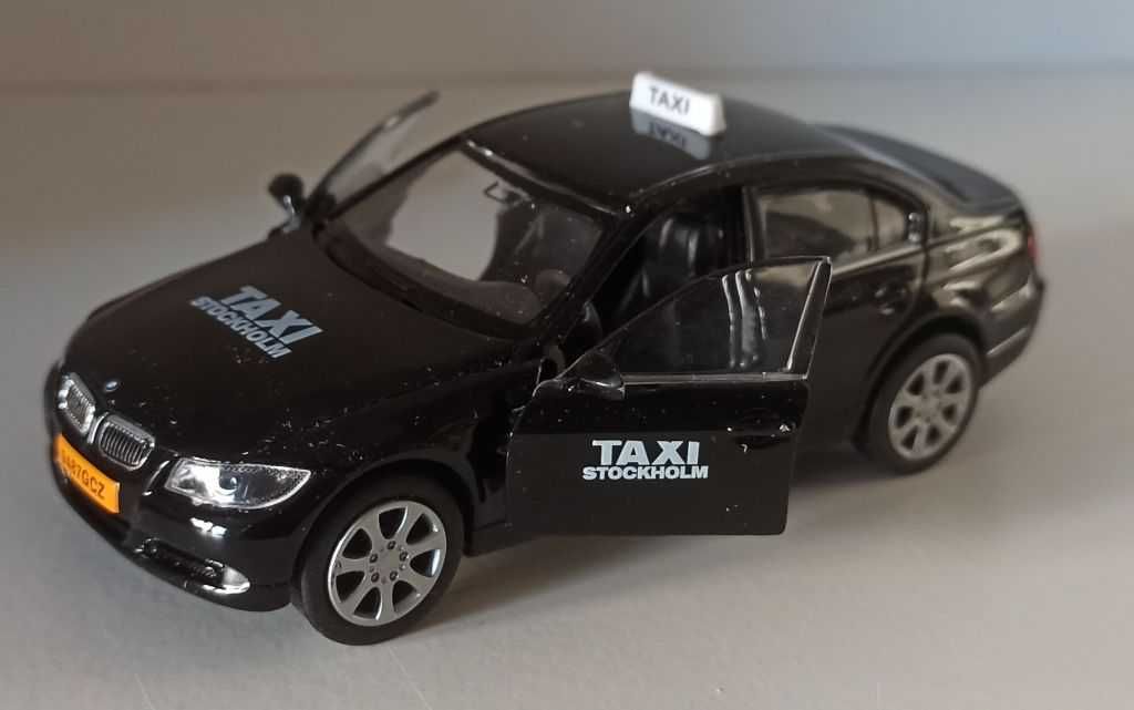 Macheta BMW 330i (E90) 2009 Taxi Stockolm - Welly 1/36