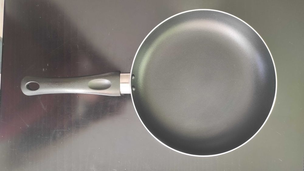 Нов тиган с незалепващо покритие