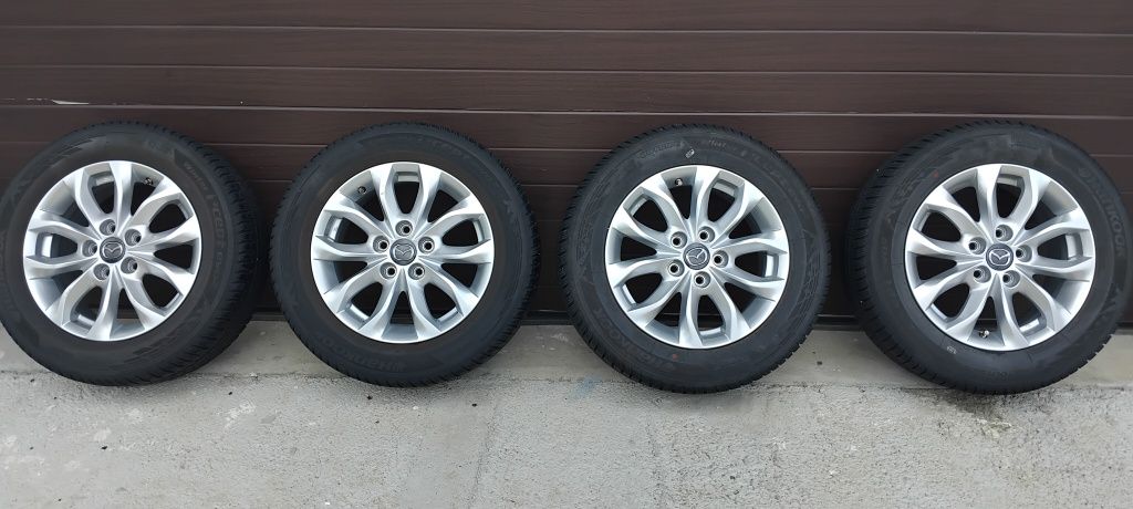 Jante aliaj originale 5x114,3 R16 ET50 Mazda anvelope 215/60 Hankook