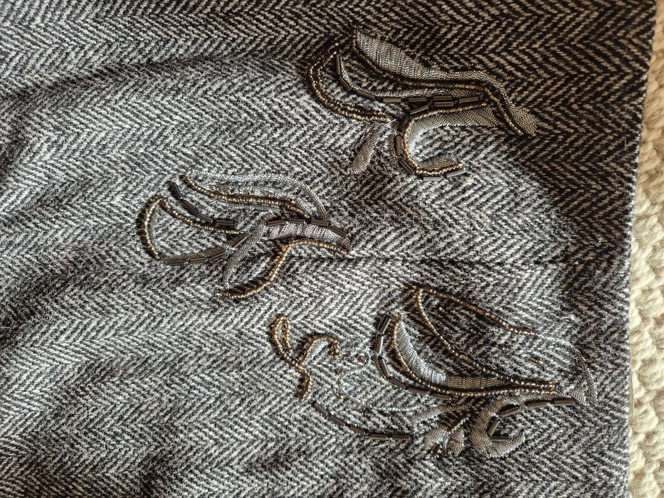 Fusta cu lână, captusita cu acetat,pozele nu i fac cinste .