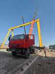 Auto kran usluga 25 ton 28 metr narhlar kelishilgan holda