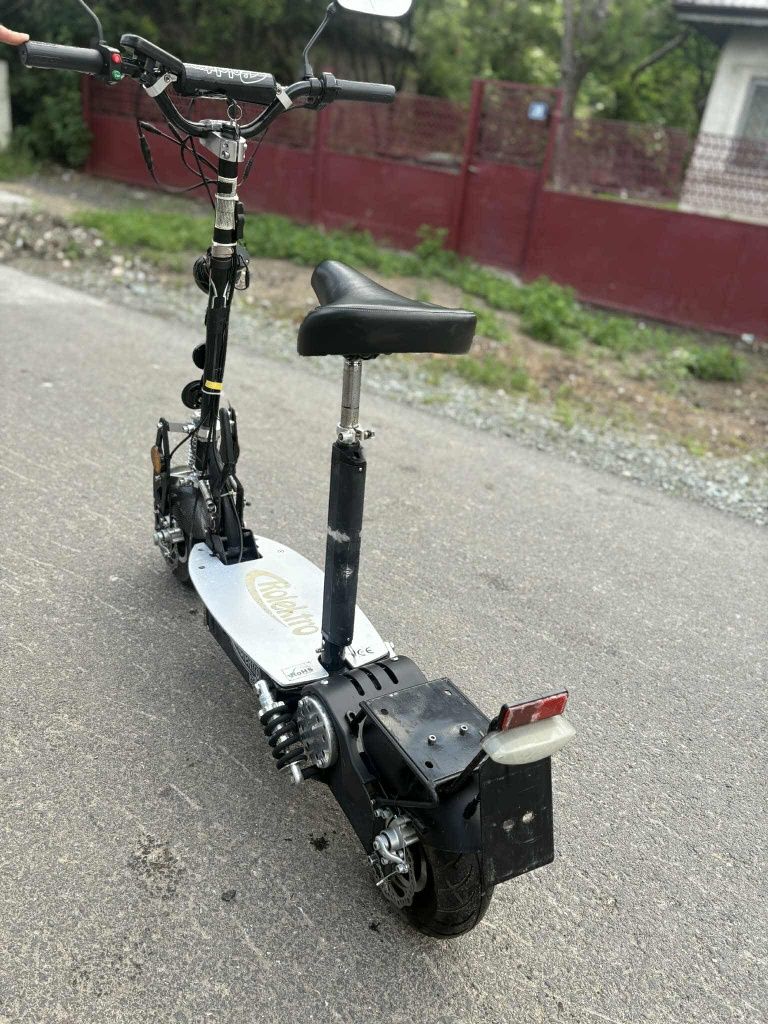Dau scuter  electric foarte puternic la schimb pe boxe active mari pas