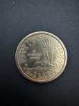 Moneda one dollar unica din anul 2000
