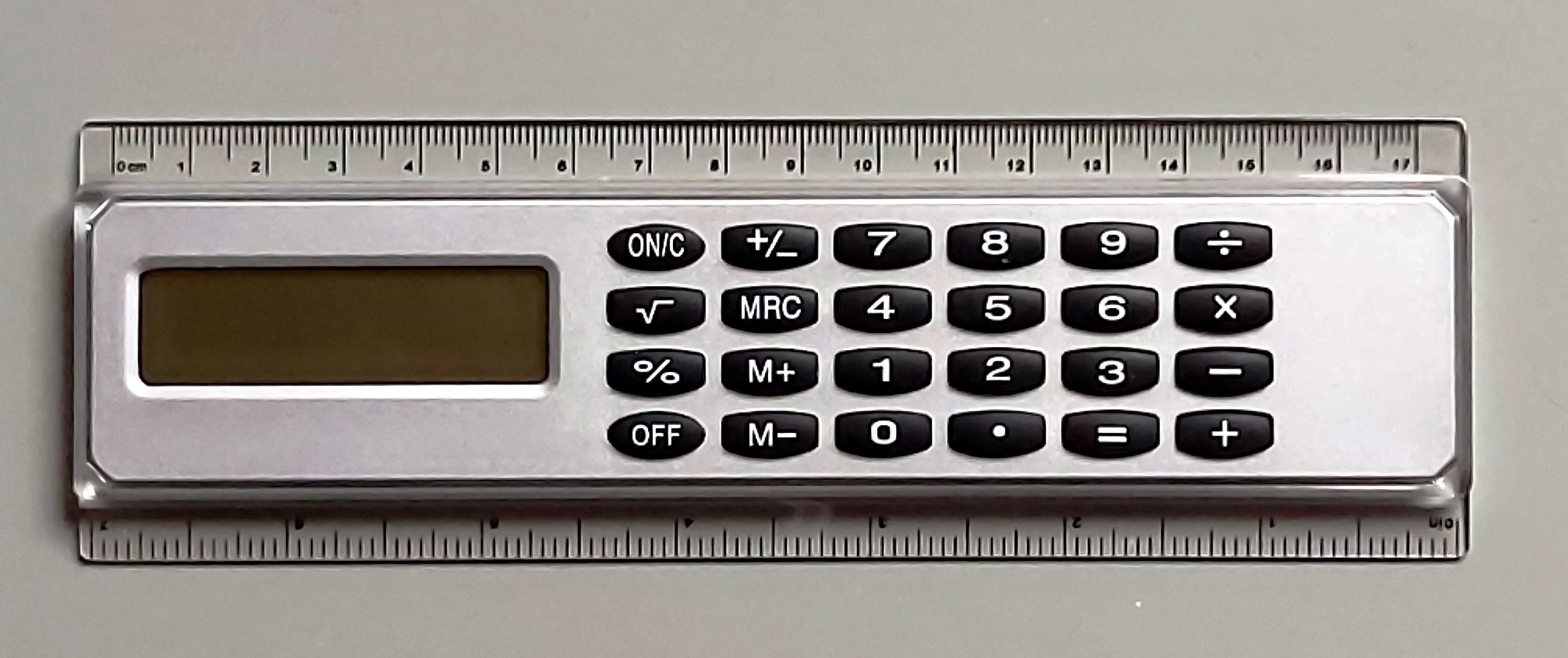 Настолен калкулатор с 2 линийки в инчове и в сантиметри