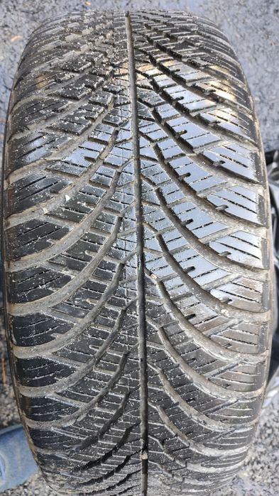 Set 4 anvelope 205/55 R15 allseason cu jante aliajFord + 20 piulite