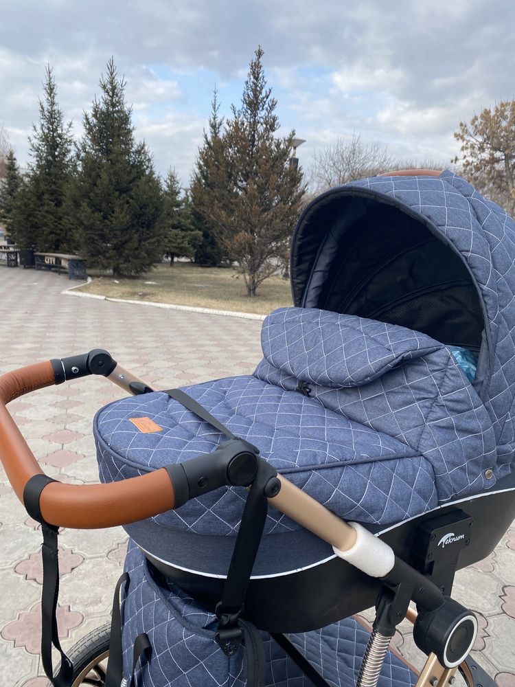 Коляска текнум