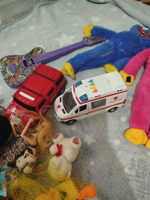 Большой пакет игрушек , в подарок маленький рюкзак