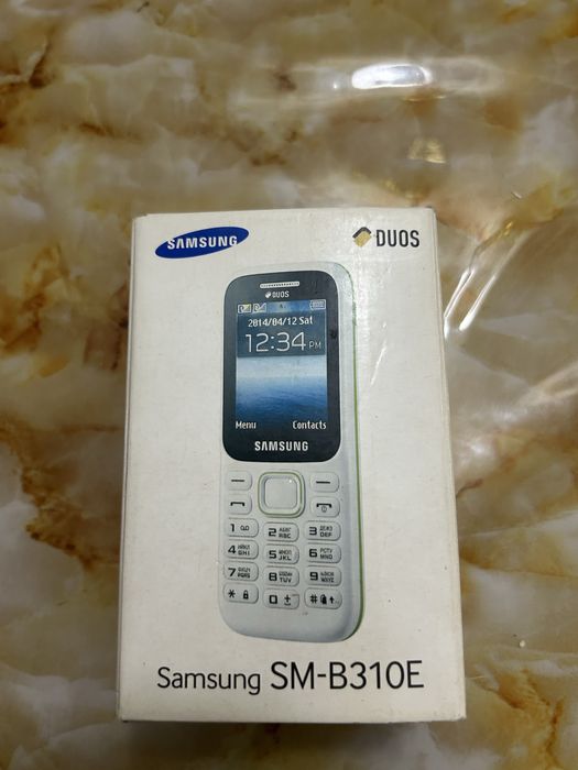 Телефон кнопочный