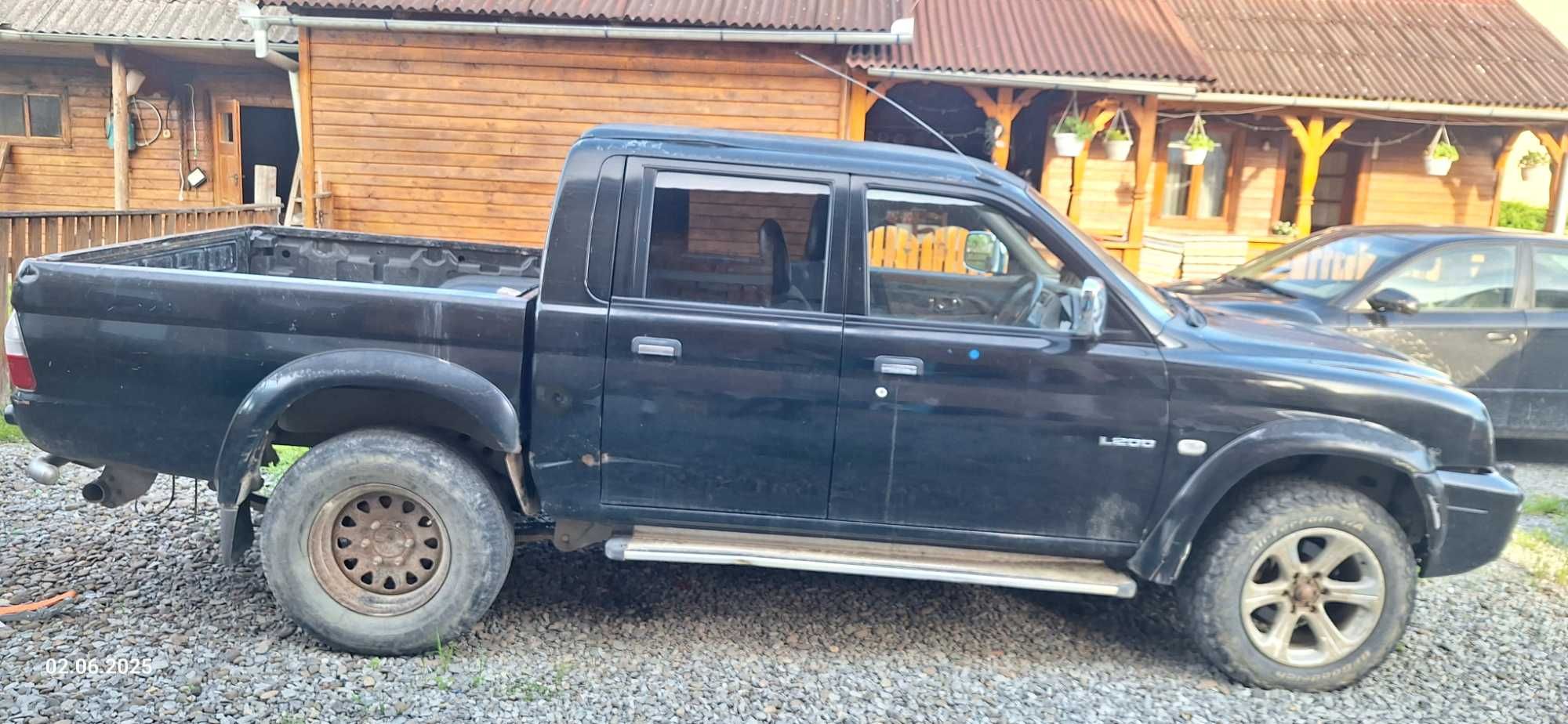 Mitsubishi l200 volan dreaptă